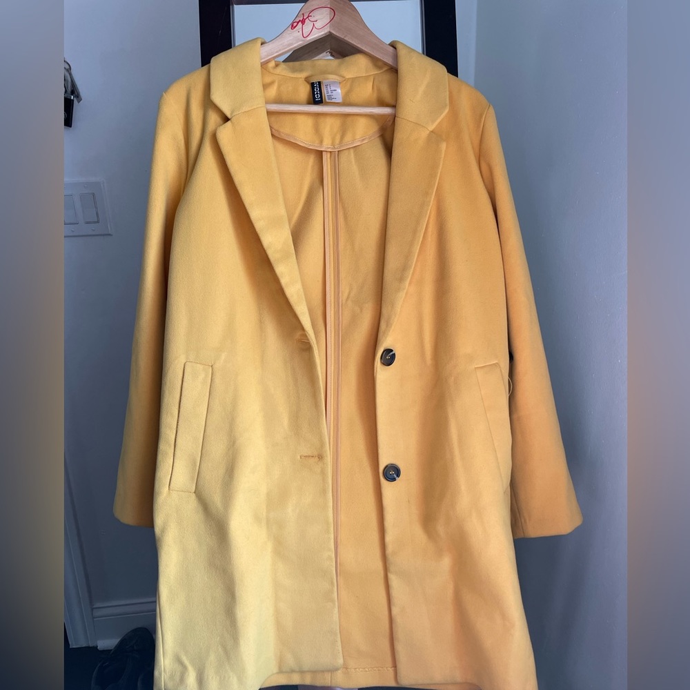 Yellow, two button trench coat. Trendy, light weight. Perfect for spring.